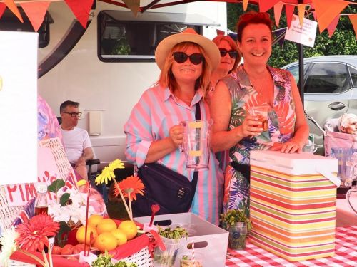 A friendly smile from the ladies on the ROtary Pimms Stall